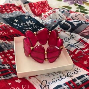 Heat things up with this sexy pink elastic bracelet